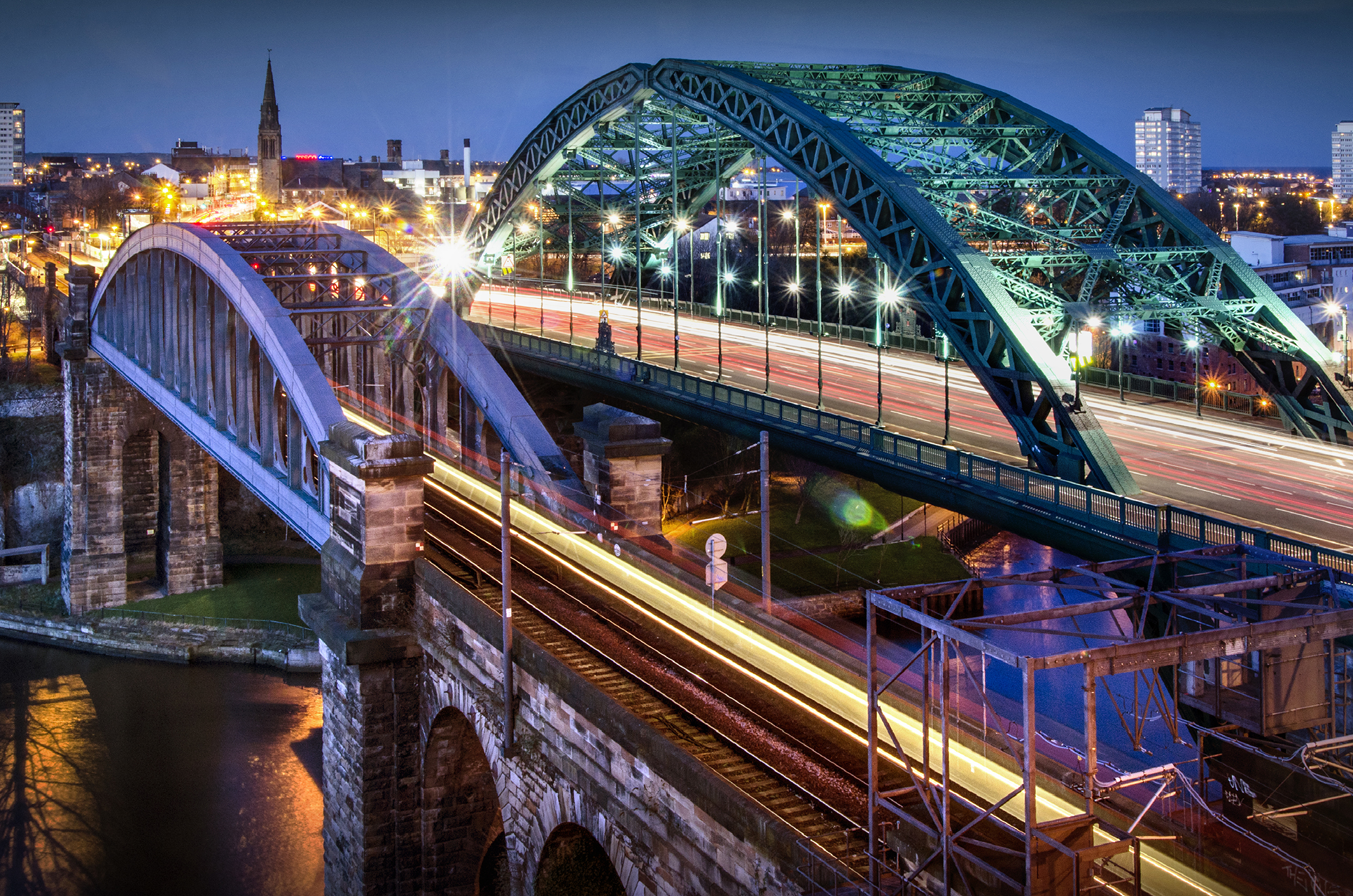 Bridges across the Wear in Sunderland, lit up in the evening